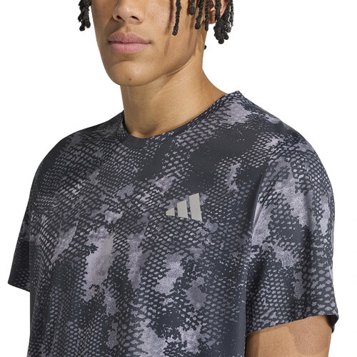 REMERA ADI365 ANIMAL PRINT